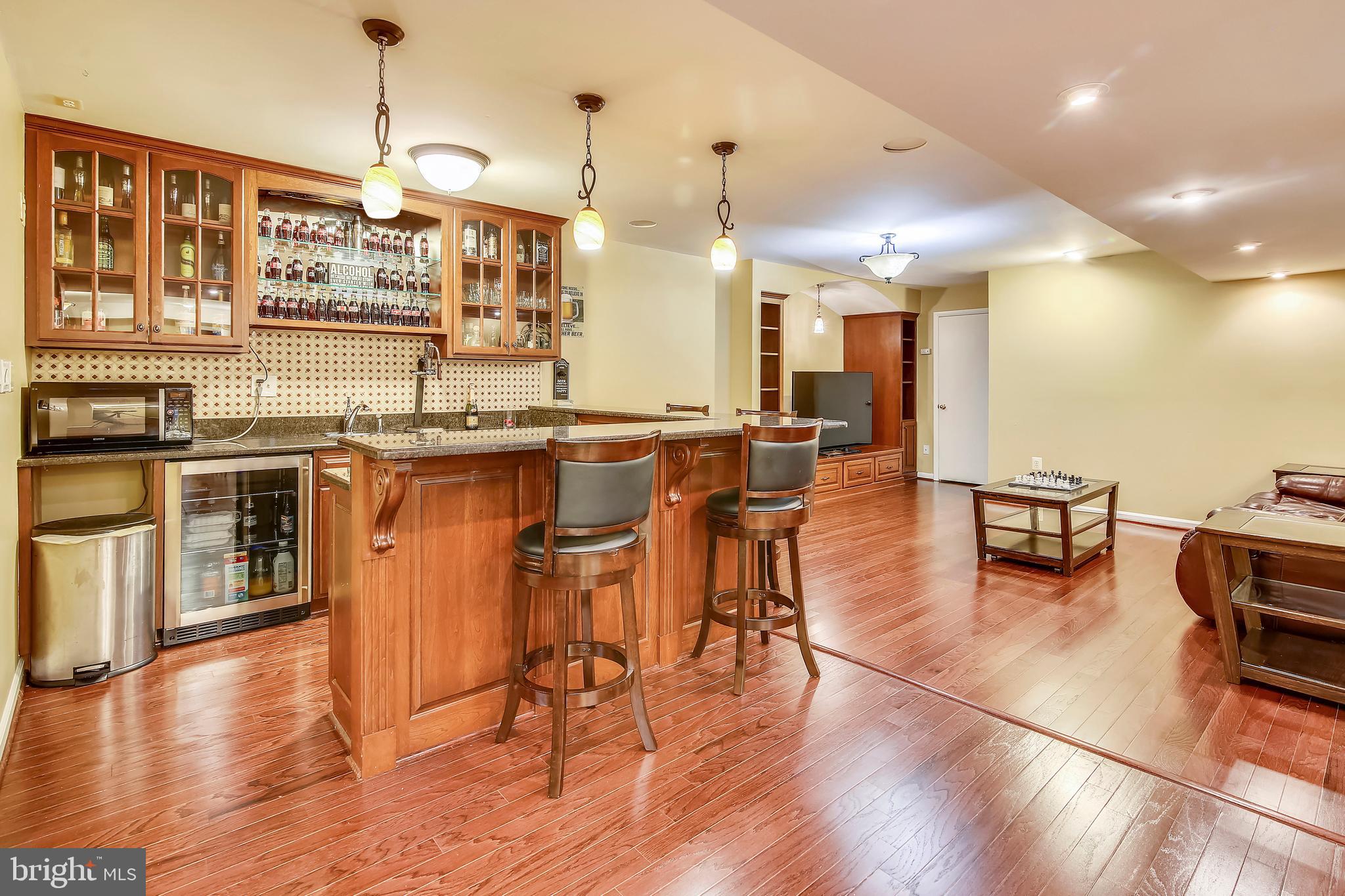 10819 Avonlea Ridge Place Damascus, MD 20872 - Photo 21 of 65 Full Sit-Down Bar Surrounded by Never-Ending Fun!!
