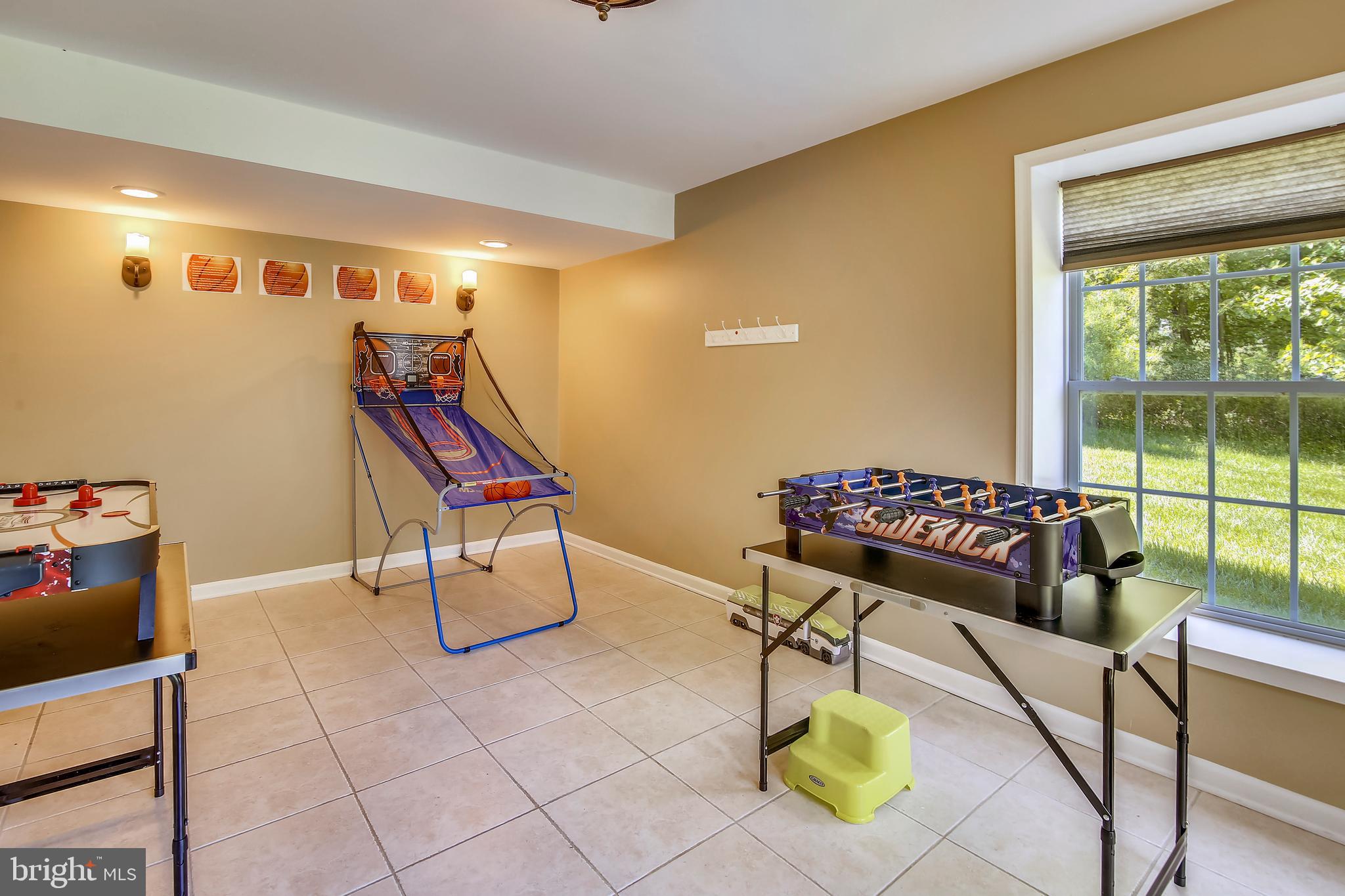 10819 Avonlea Ridge Place Damascus, MD 20872 - Photo 29 of 65 13 x11 Game Room w/ Walk-Out to the Rear Yard
