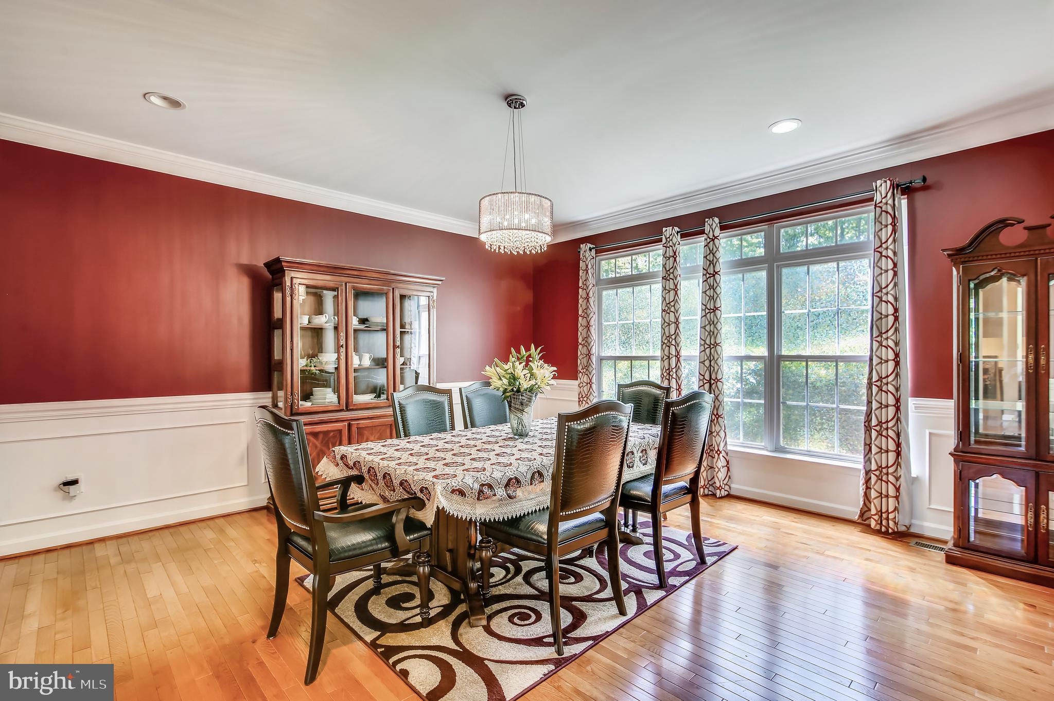 10819 Avonlea Ridge Place Damascus, MD 20872 - Photo 8 of 65 Formal Dining Room has Crown Molding and Wainscot!