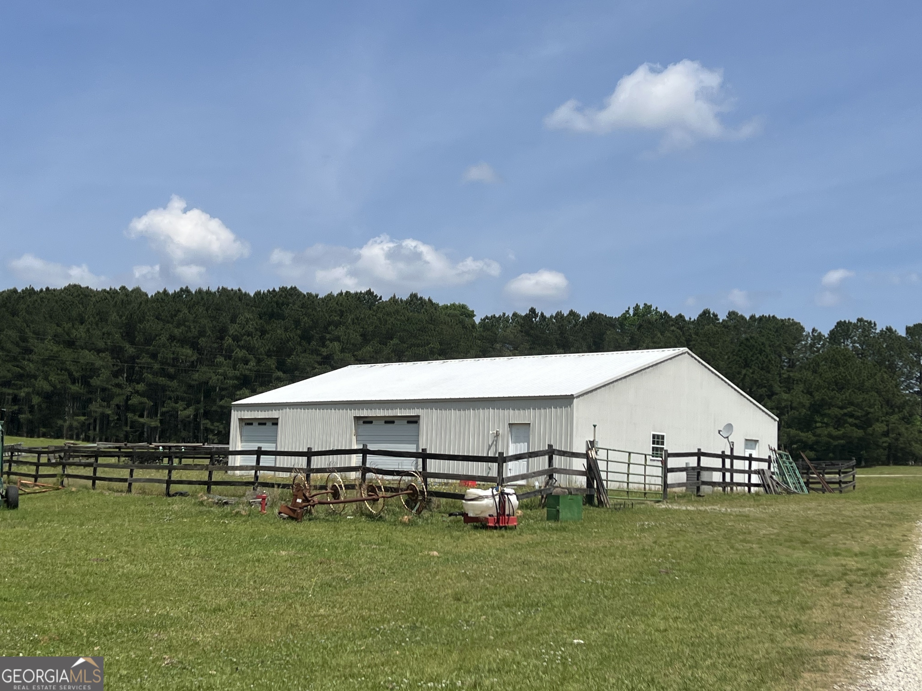 2853 Highway 81 Hampton, GA 30228 - Photo 14 of 16 a aerial view of a house with table and chairs