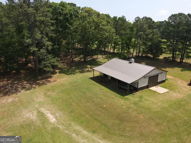 a view of an outdoor space and basketball court