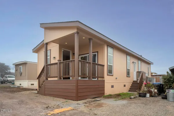 a front view of a house with a garage