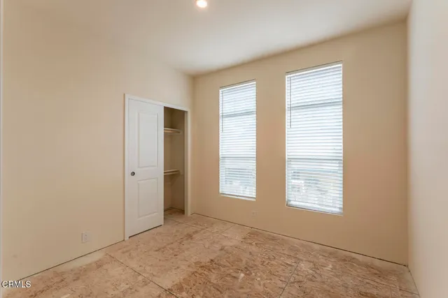 an empty room with windows