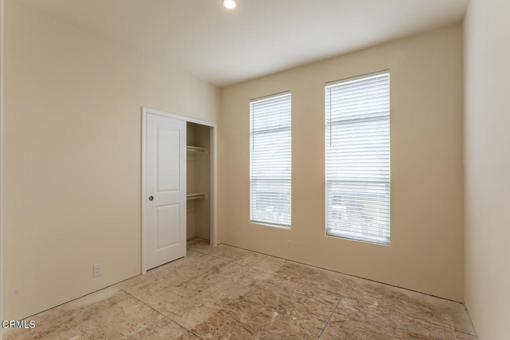 1021 South Main Street, Unit 2 Fort Bragg, CA 95437 - Photo 11 of 19 an empty room with windows