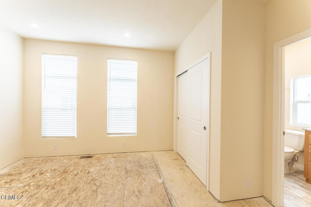 1021 South Main Street, Unit 2 Fort Bragg, CA 95437 - Photo 14 of 19 a view of an empty room with a window