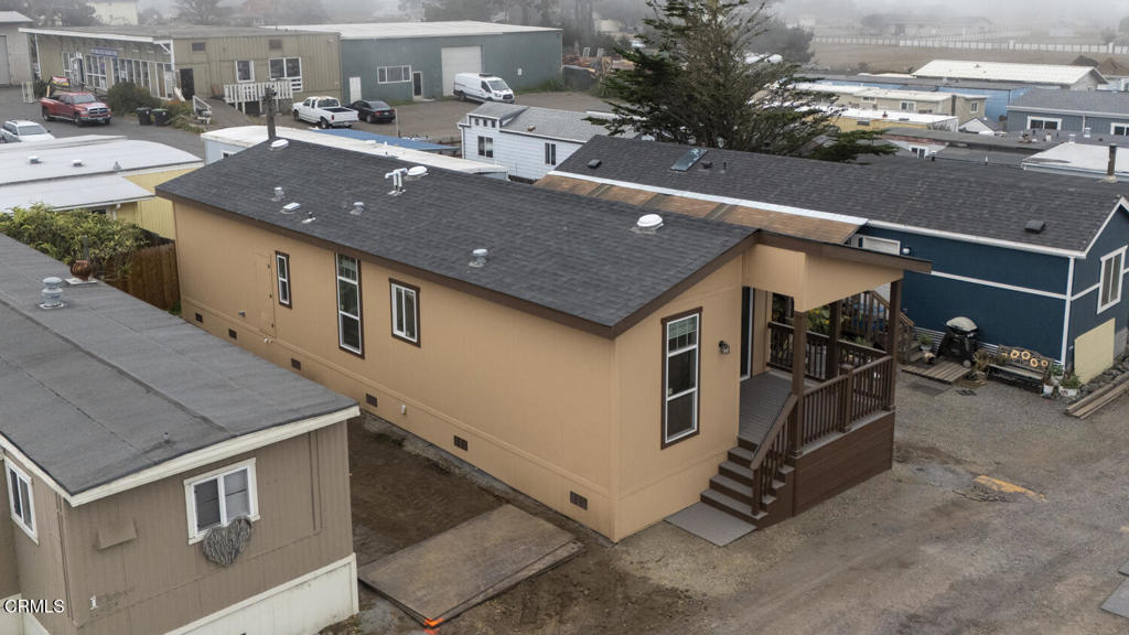 1021 South Main Street, Unit 2 Fort Bragg, CA 95437 - Photo 17 of 19 a view of a patio with table and chairs