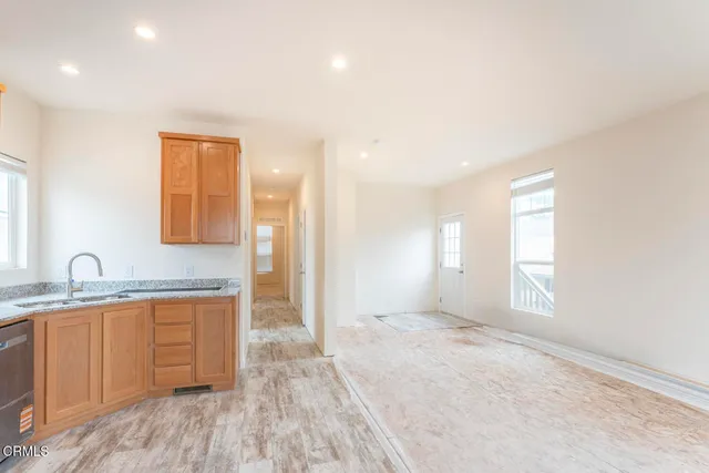 a view of a kitchen and a sink