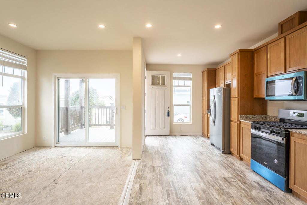 1021 South Main Street, Unit 2 Fort Bragg, CA 95437 - Photo 6 of 19 a view of a kitchen with a sink and a window