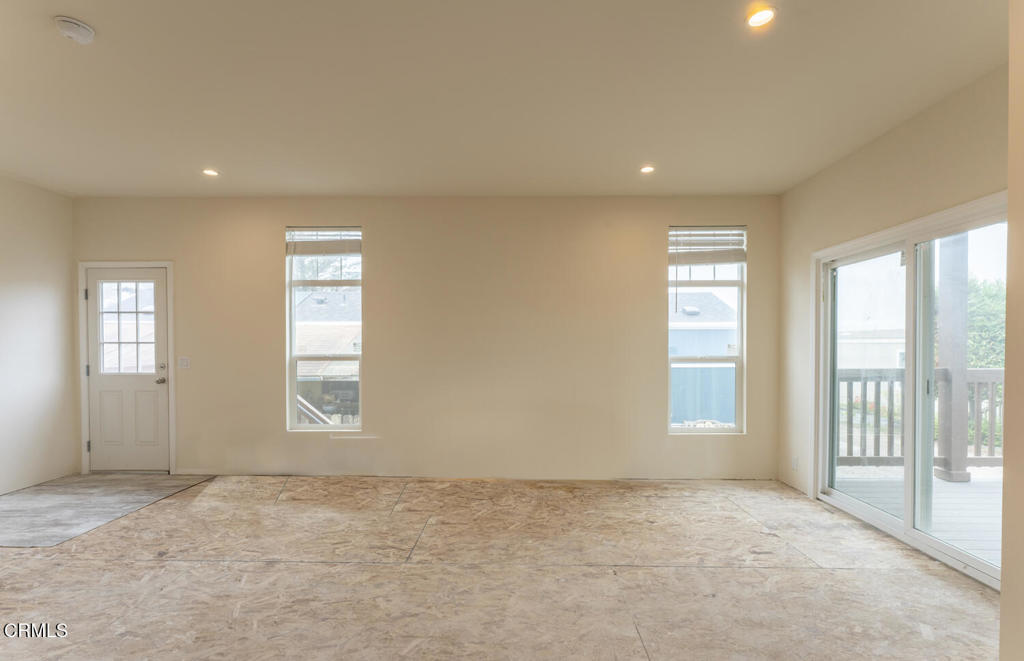 1021 South Main Street, Unit 2 Fort Bragg, CA 95437 - Photo 7 of 19 a view of an empty room and window