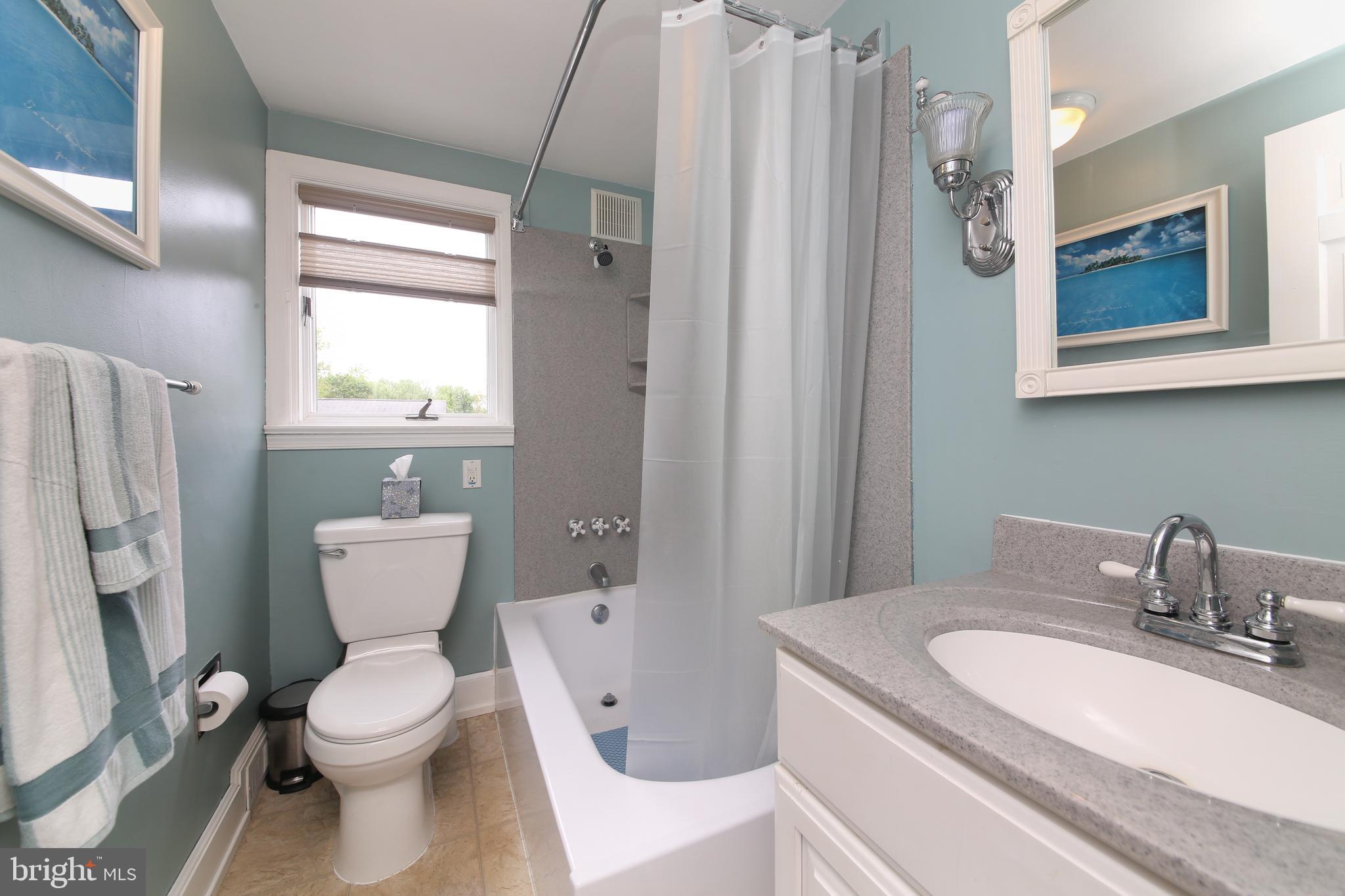 150 Edison Furlong Road Doylestown, PA 18901 - Photo 21 of 36 a white toilet sitting next to a bathroom sink