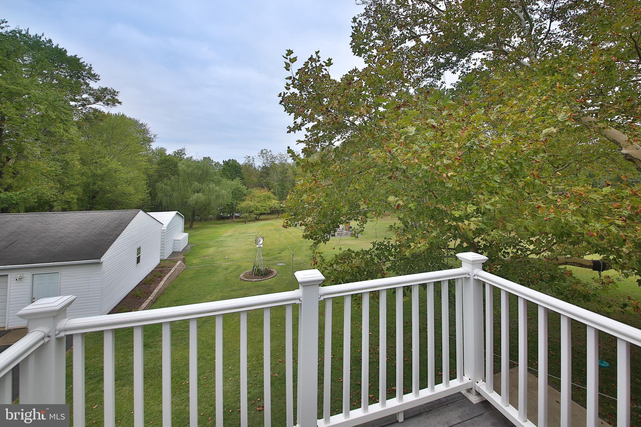 150 Edison Furlong Road Doylestown, PA 18901 - Photo 23 of 36 a balcony with a yard