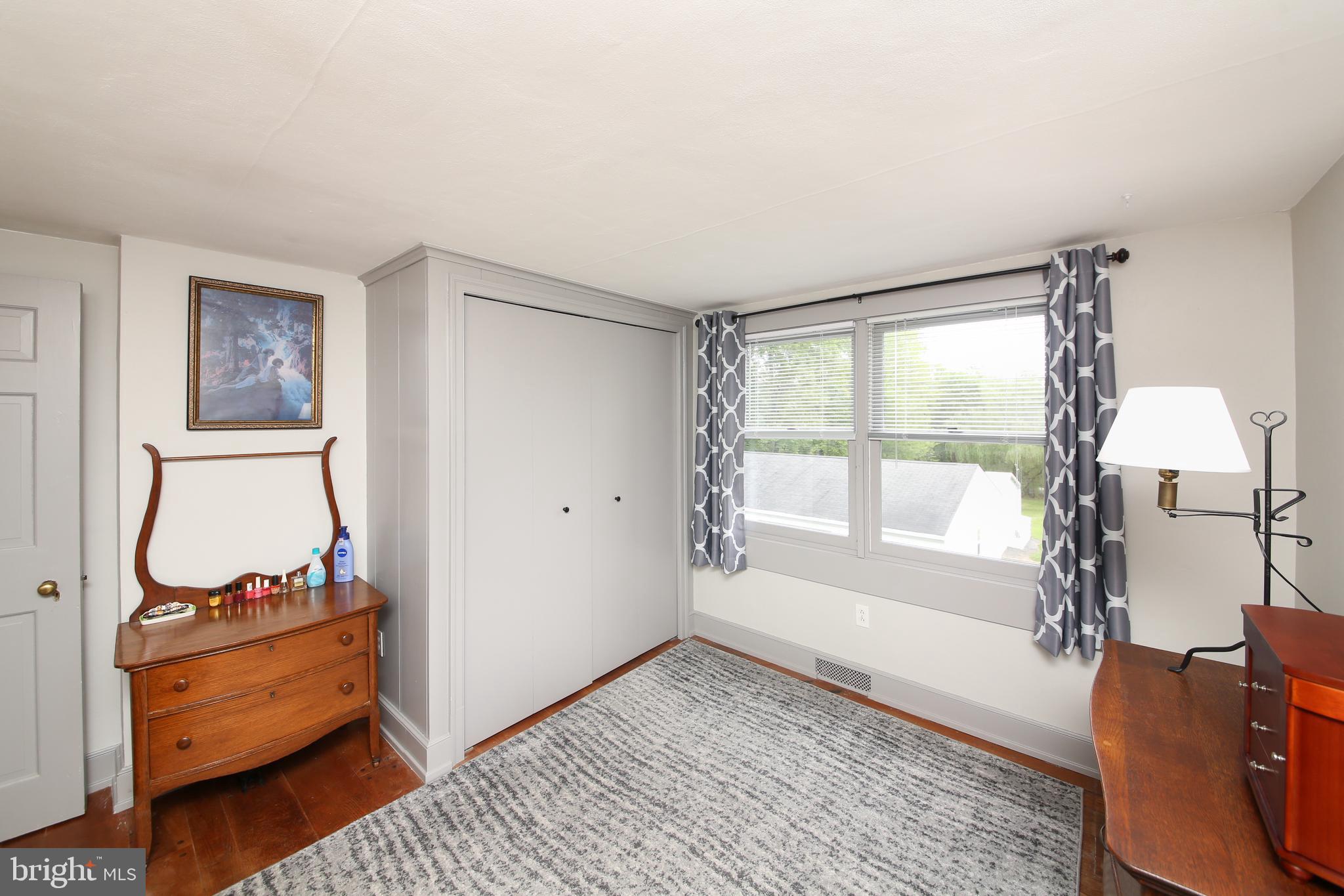150 Edison Furlong Road Doylestown, PA 18901 - Photo 24 of 36 a room with furniture and a window