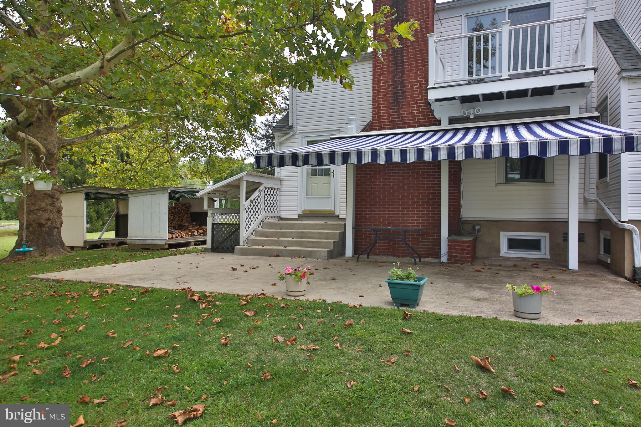 150 Edison Furlong Road Doylestown, PA 18901 - Photo 31 of 36 a view of a house with a yard and a garage