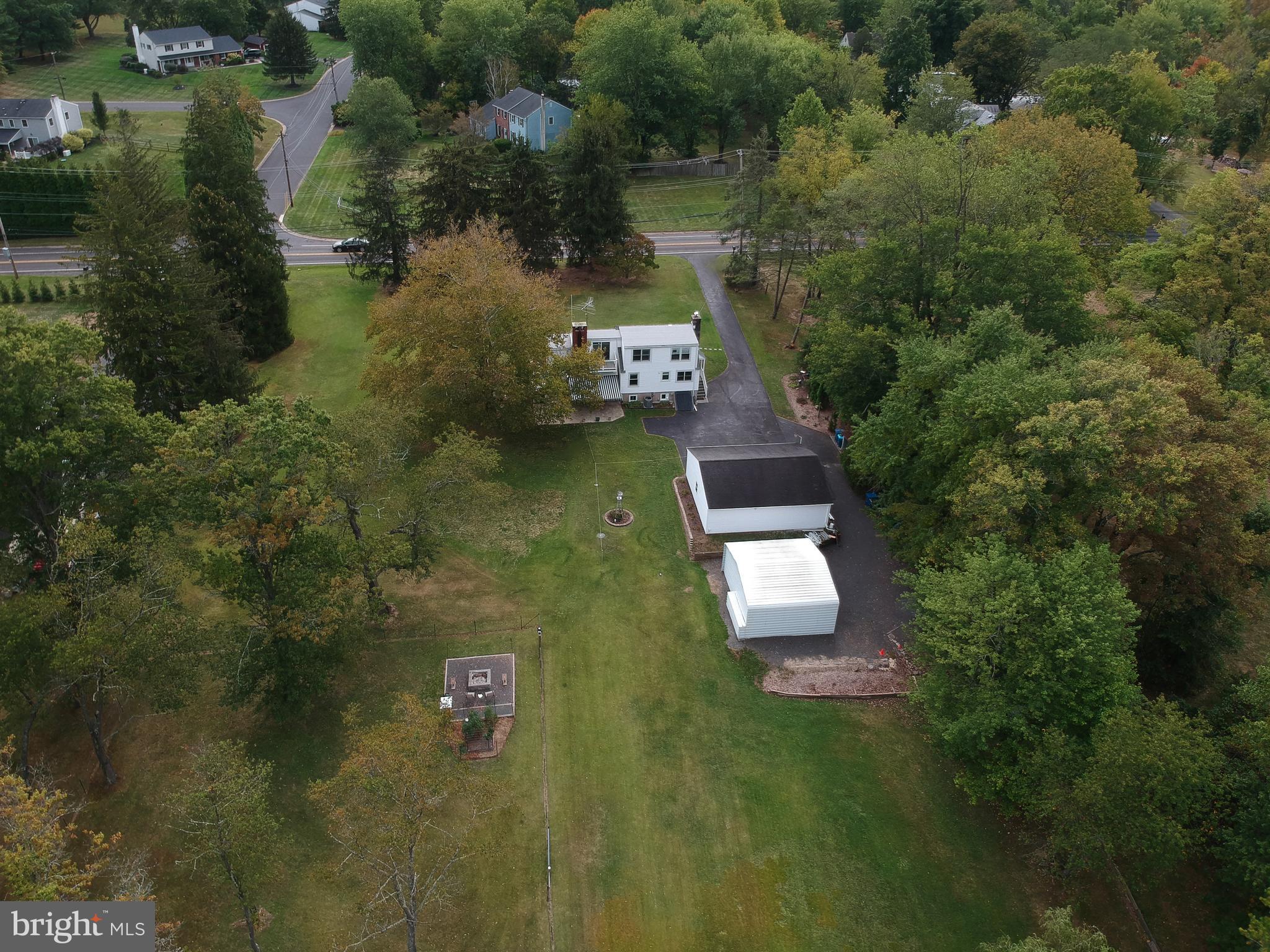 150 Edison Furlong Road Doylestown, PA 18901 - Photo 34 of 36 an aerial view of a house with a yard