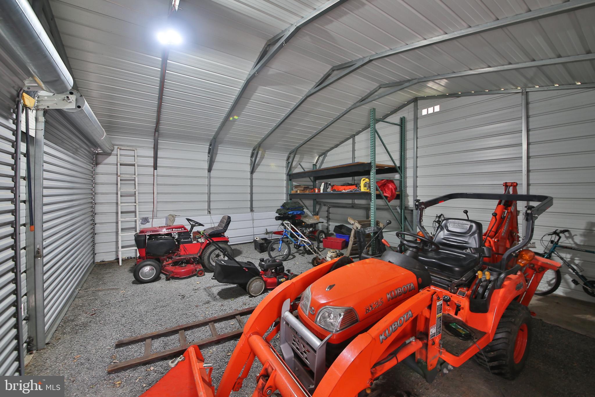 150 Edison Furlong Road Doylestown, PA 18901 - Photo 8 of 36 a view of a garage with stuff