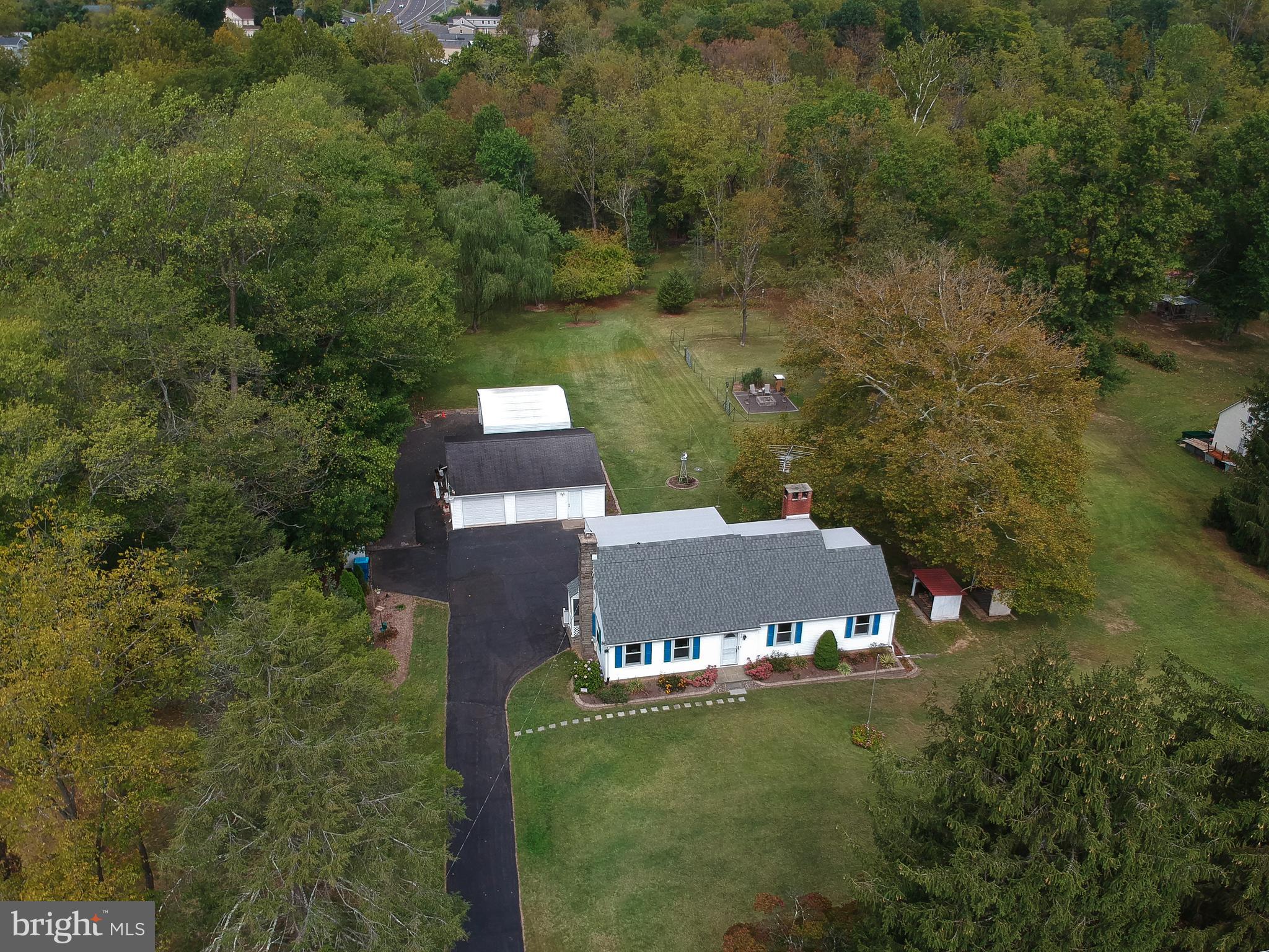 150 Edison Furlong Road Doylestown, PA 18901 - Photo 9 of 36 a view of a house with a yard