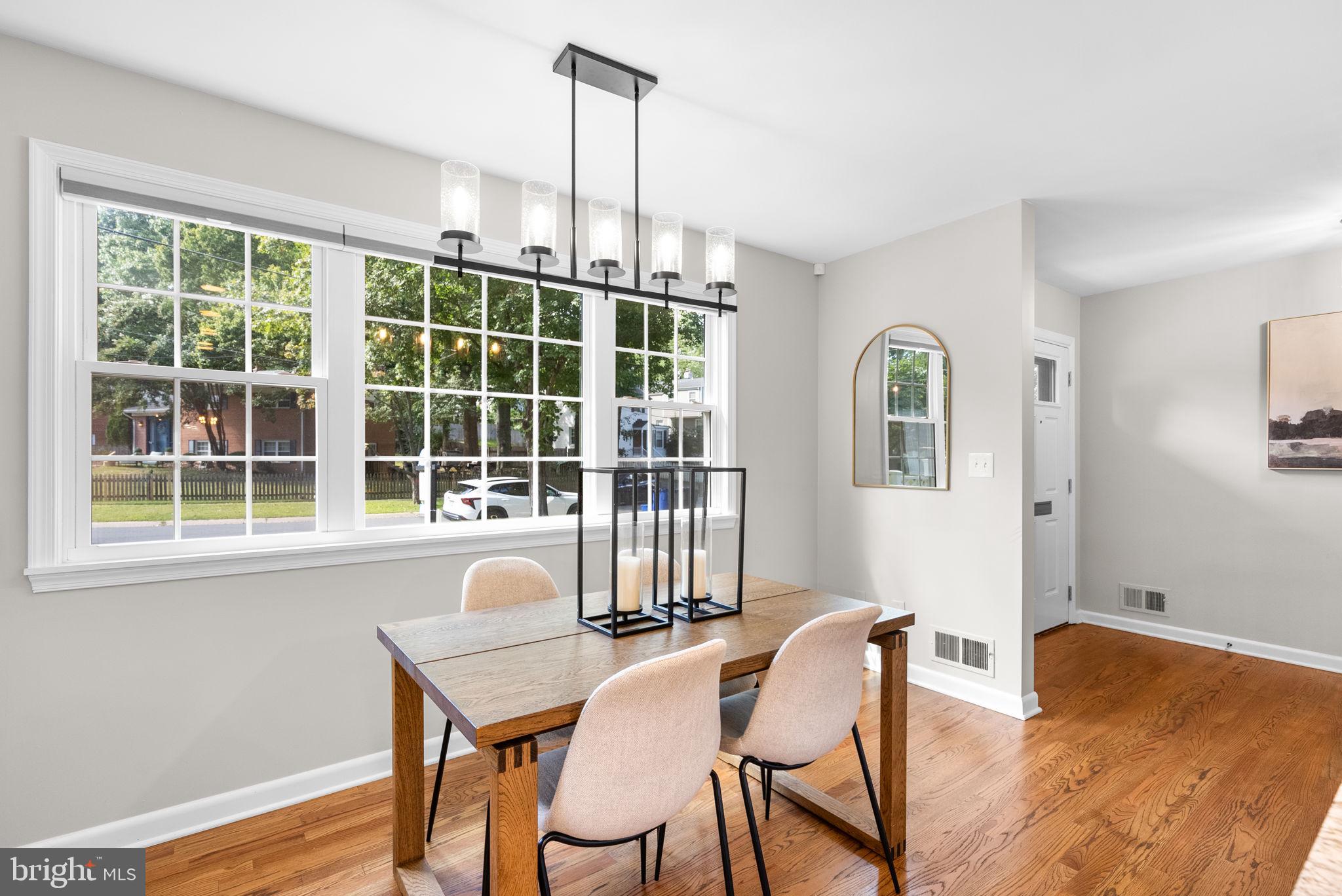 9907 Big Rock Road Silver Spring, MD 20901 - Photo 15 of 45 a view of a workspace with furniture and a window