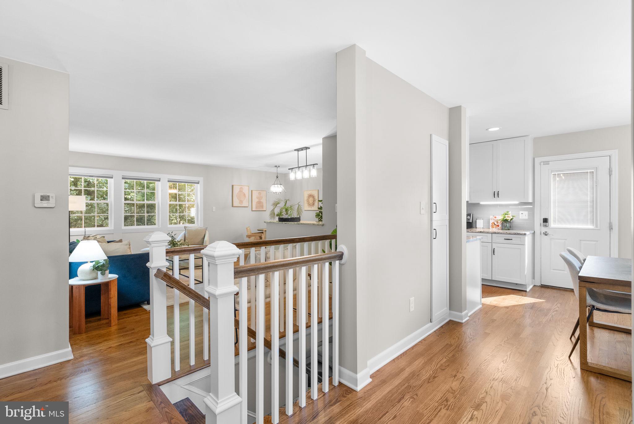 9907 Big Rock Road Silver Spring, MD 20901 - Photo 17 of 45 a view of a kitchen with furniture and wooden floor