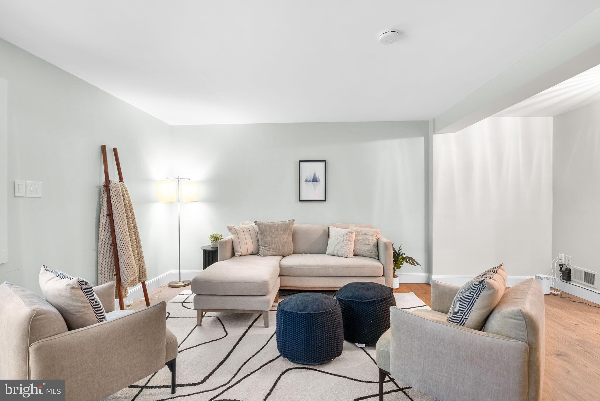 9907 Big Rock Road Silver Spring, MD 20901 - Photo 28 of 45 a living room with furniture and a couch