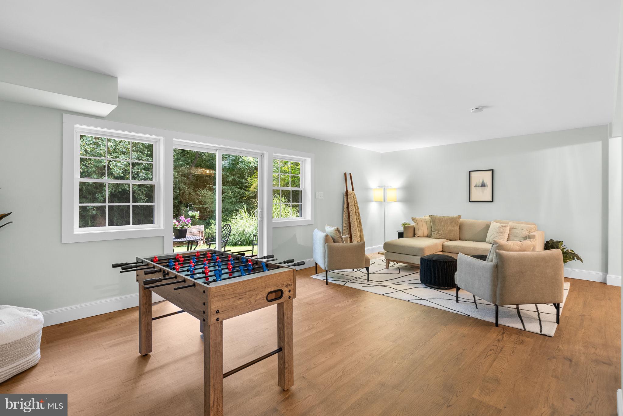 9907 Big Rock Road Silver Spring, MD 20901 - Photo 31 of 45 a living room with furniture and a window