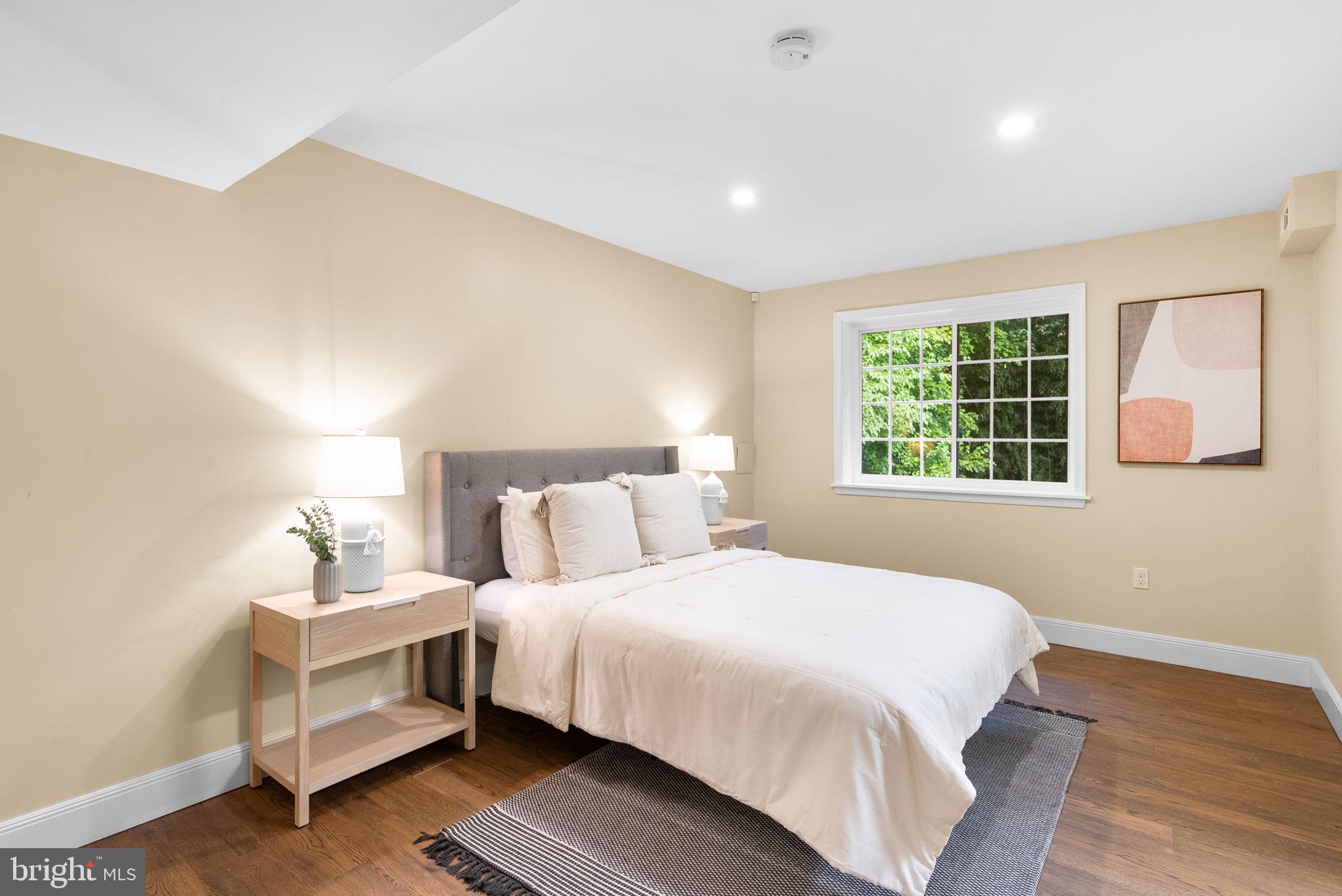 9907 Big Rock Road Silver Spring, MD 20901 - Photo 35 of 45 a bedroom with a bed and a window