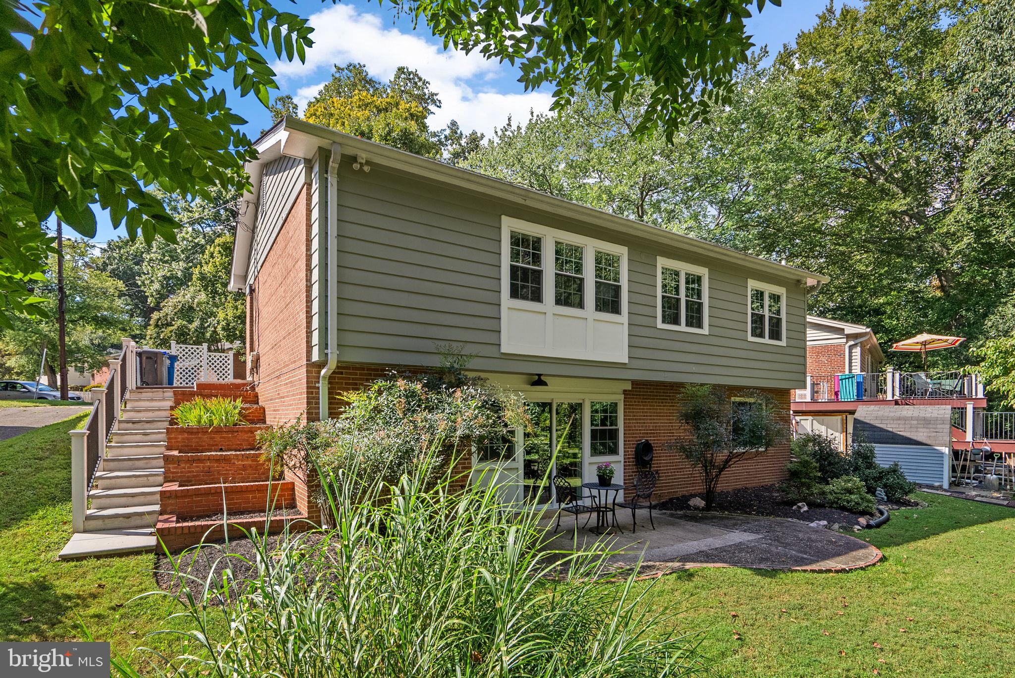 9907 Big Rock Road Silver Spring, MD 20901 - Photo 41 of 45 a backyard of a house with seating space