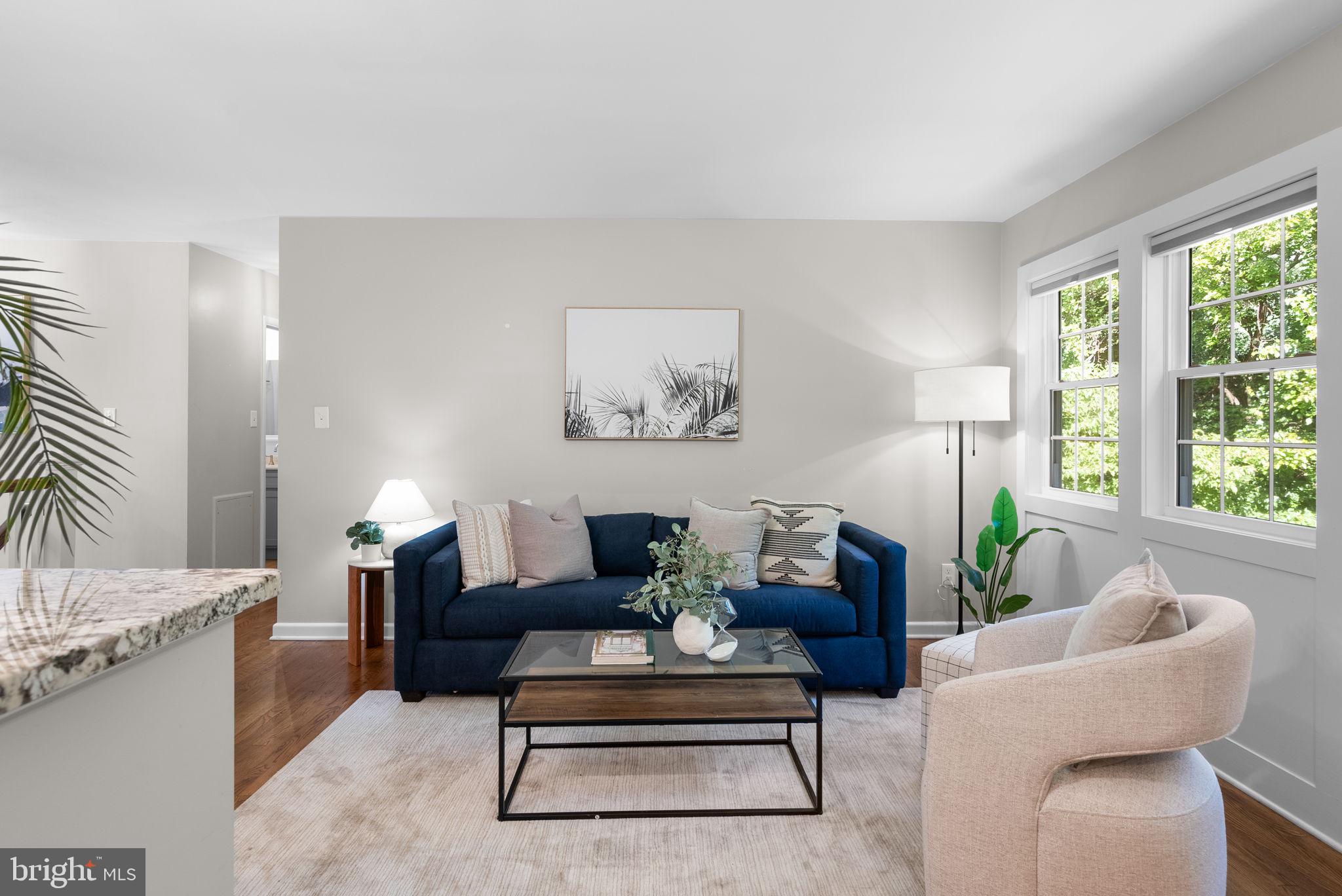 9907 Big Rock Road Silver Spring, MD 20901 - Photo 7 of 45 a living room with furniture and a large window
