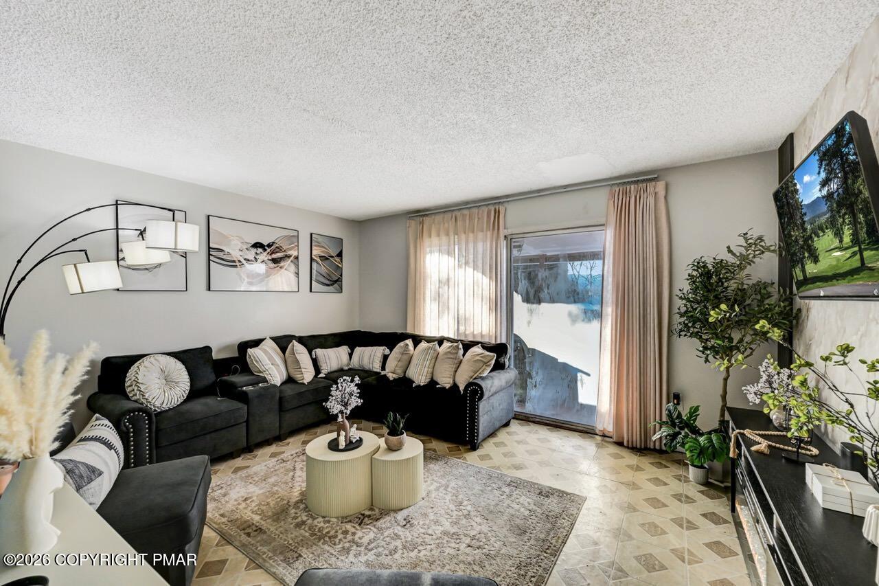 844 South Front Street Allentown, PA 18103 - Photo 11 of 45 a living room with furniture and a flat screen tv