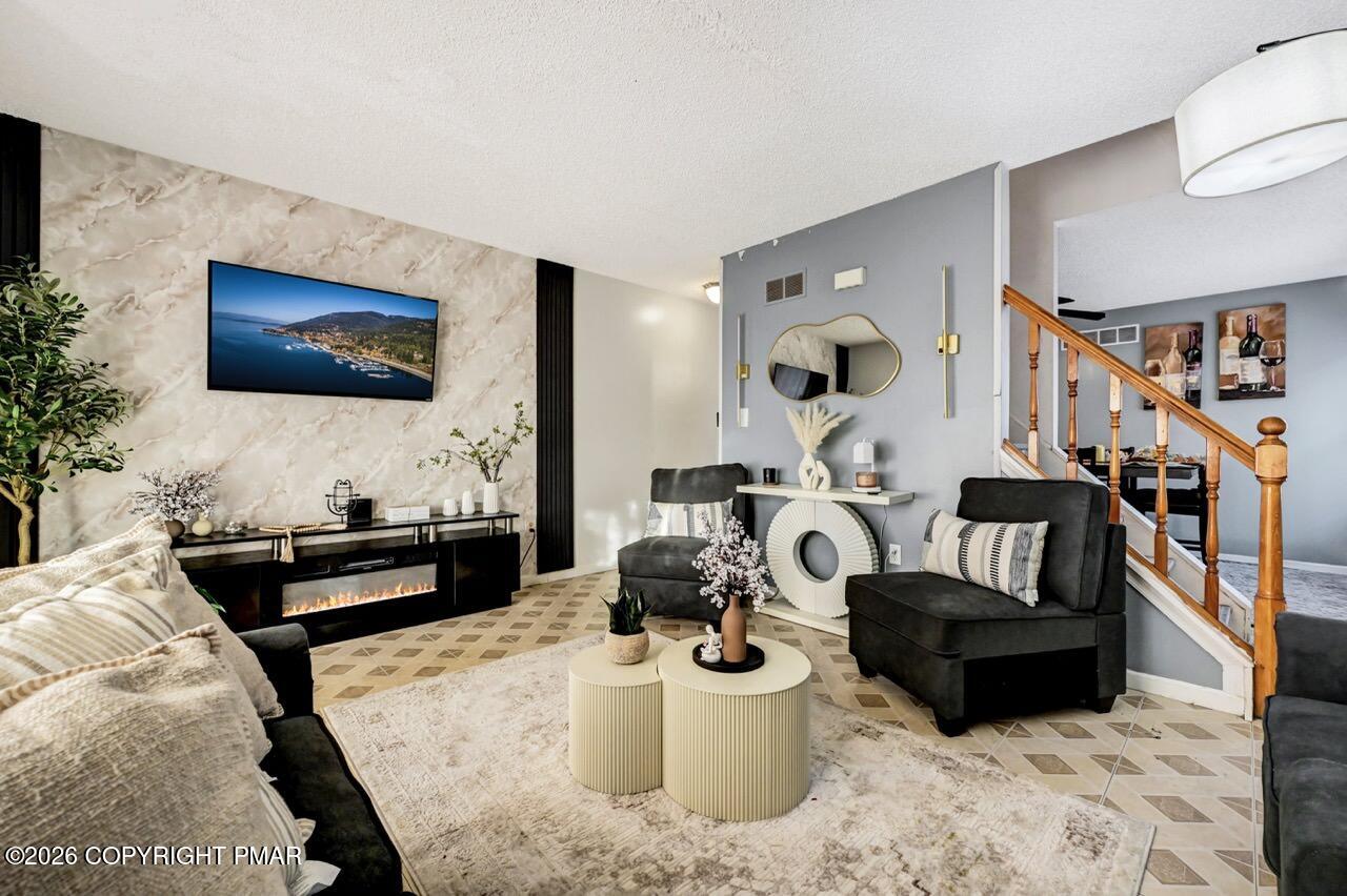 844 South Front Street Allentown, PA 18103 - Photo 14 of 45 a living room with furniture and a flat screen tv