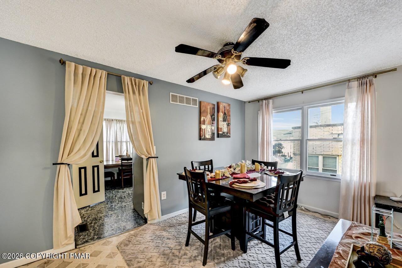 844 South Front Street Allentown, PA 18103 - Photo 19 of 45 a view of a dining room with furniture window and wooden floor