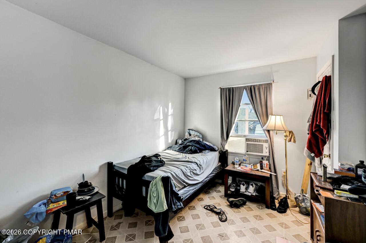 844 South Front Street Allentown, PA 18103 - Photo 38 of 45 a bedroom with furniture and a window