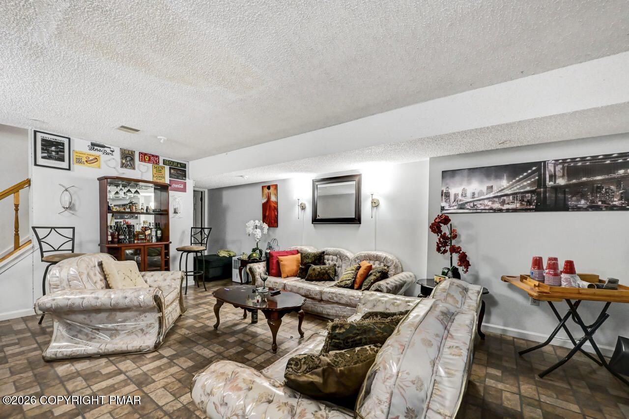 844 South Front Street Allentown, PA 18103 - Photo 4 of 45 a living room with furniture and a wooden floor