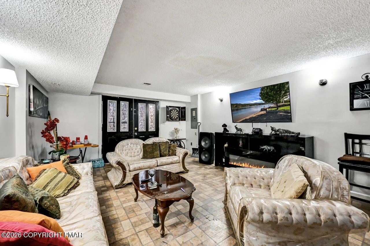 844 South Front Street Allentown, PA 18103 - Photo 6 of 45 a living room with furniture and a flat screen tv