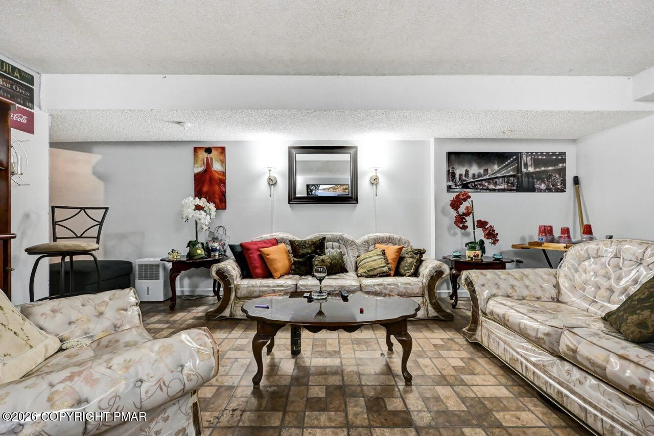 844 South Front Street Allentown, PA 18103 - Photo 8 of 45 a living room with furniture and rug