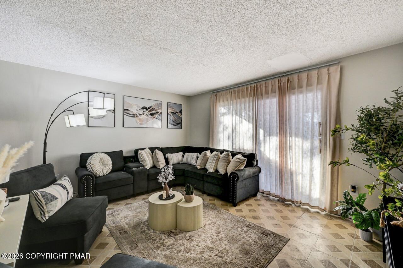 844 South Front Street Allentown, PA 18103 - Photo 10 of 45 a living room with furniture and a window