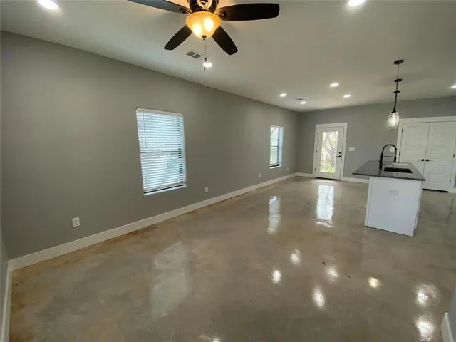 a view of an empty room and window