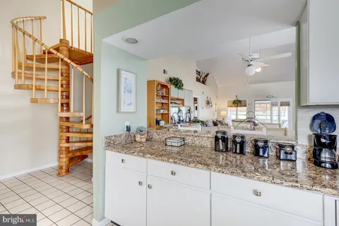 a view of living room with furniture and floor