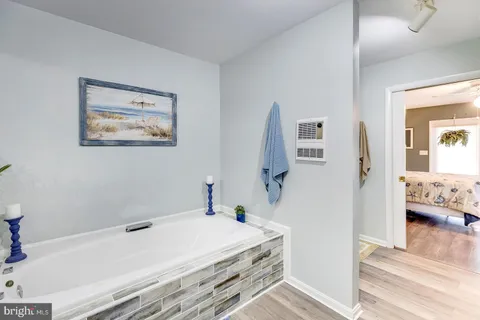 a bathroom with a shower and toilet