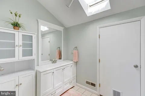 a view of a deck with two chairs and a table