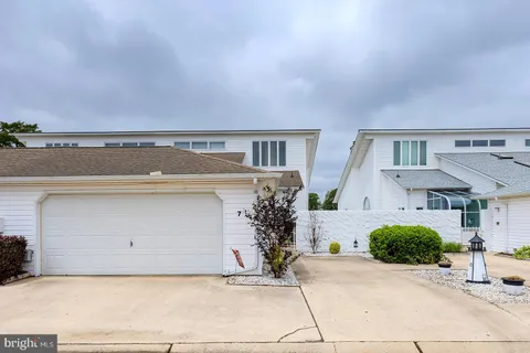a view of a lake with a house