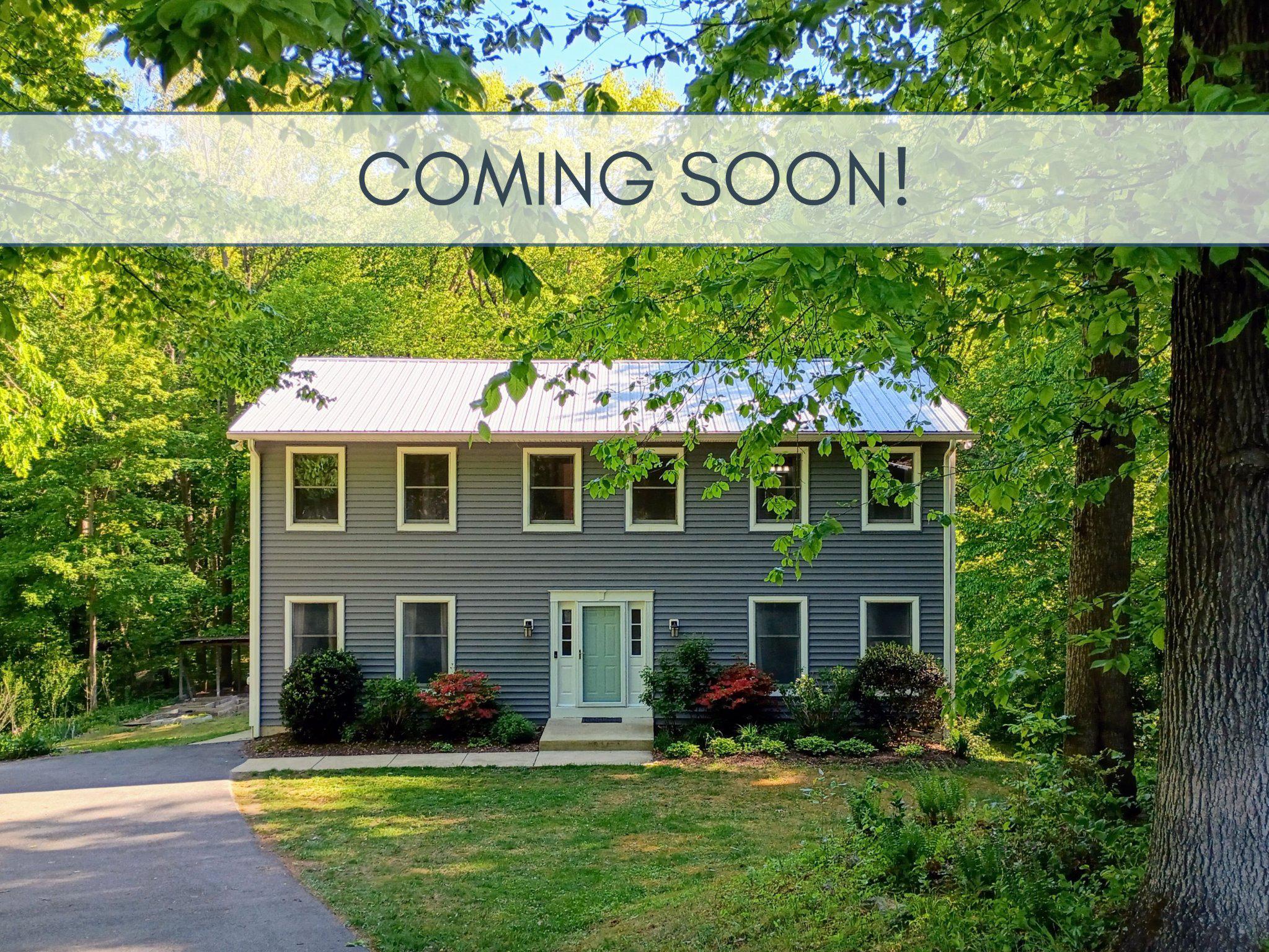 Charming home nestled in nature on 3 acres!