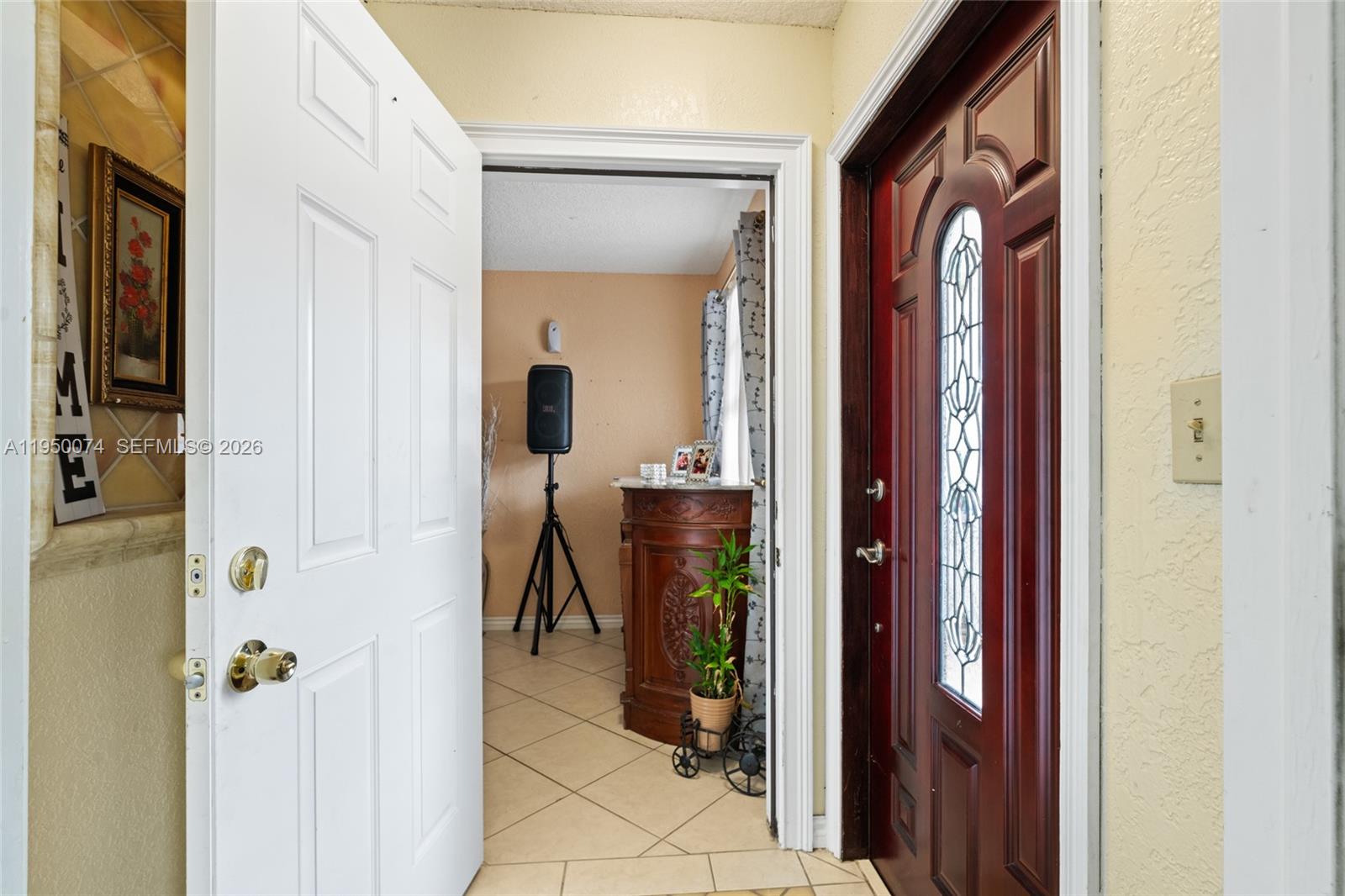 5951 Southwest 4th Street Miami, FL 33144 - Photo 4 of 23 a view of a hallway with a elevator