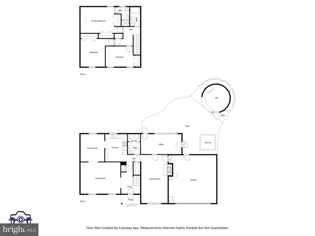 a view of a patio with a table and chairs under an umbrella