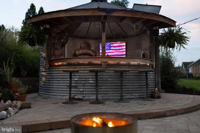 a view of a house with a big yard