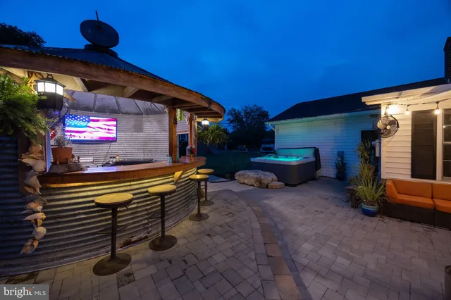 a view of a chairs and tables in the patio