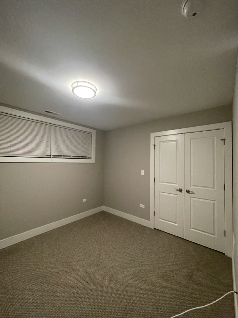 215 South Hamilton Avenue, Unit 1N Chicago, IL 60612 - Photo 18 of 23 a view of an empty room