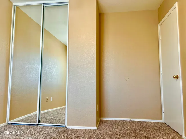 a house with swimming pool in front of it