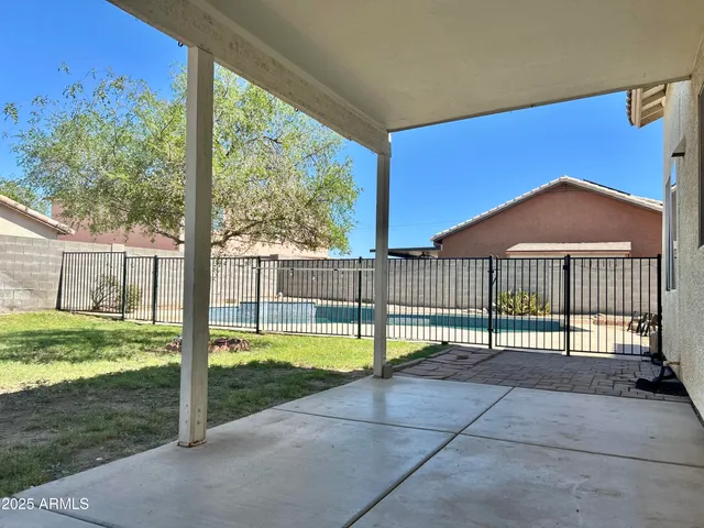 a view of a garden with a tree