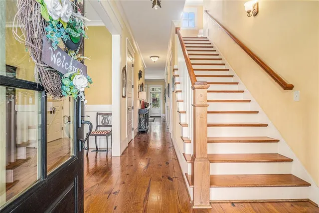 a kitchen with stainless steel appliances kitchen island granite countertop a refrigerator and stove