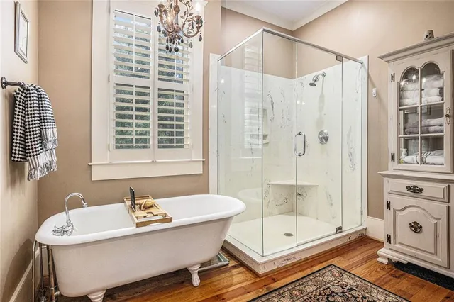 a view of entryway with wooden floor